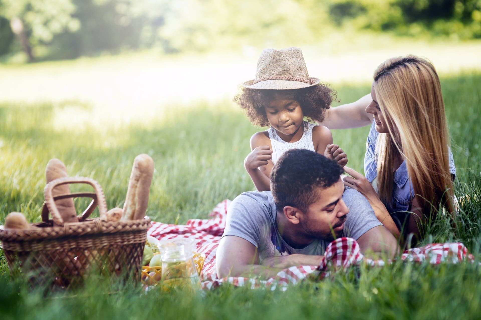 family on rural land enjoing a picnic